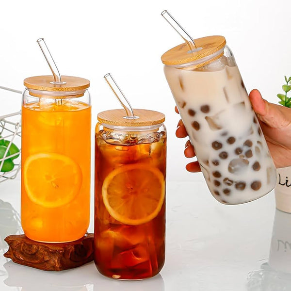Plain glass cup with bamboo lids and straw